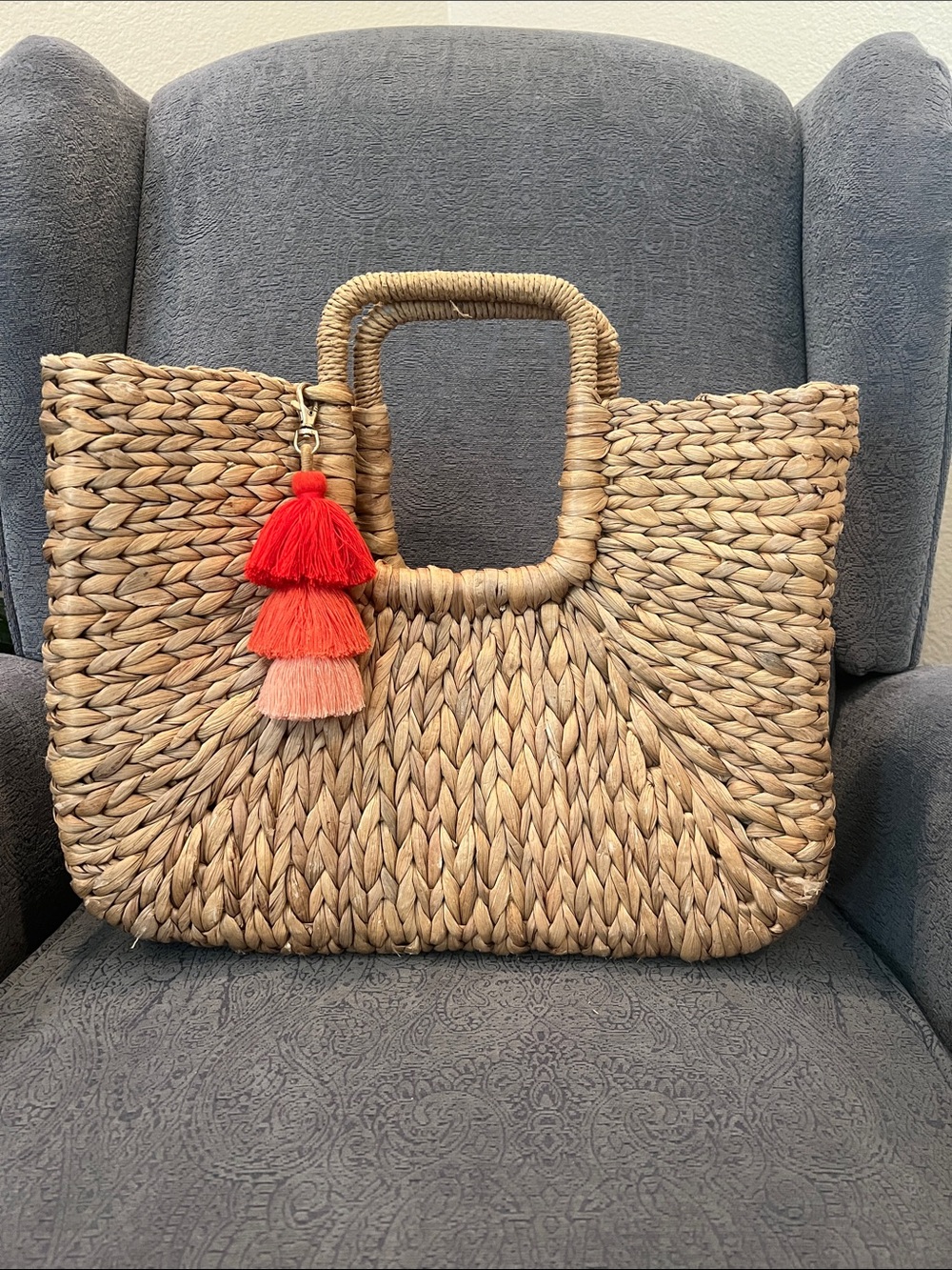 Woven Straw Tote Bag with Red-Orange Tassel